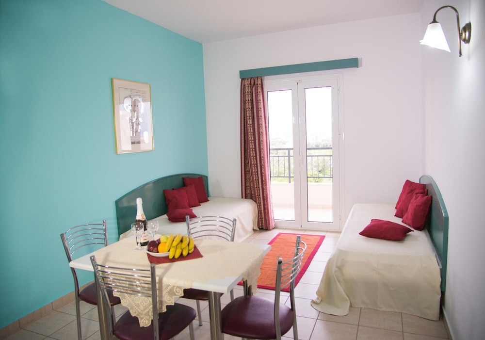 Theoni Apartments — Hotel rooms in Malia
