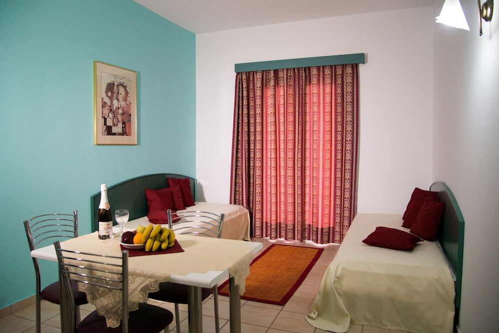Theoni Apartments — Hotel rooms in Malia