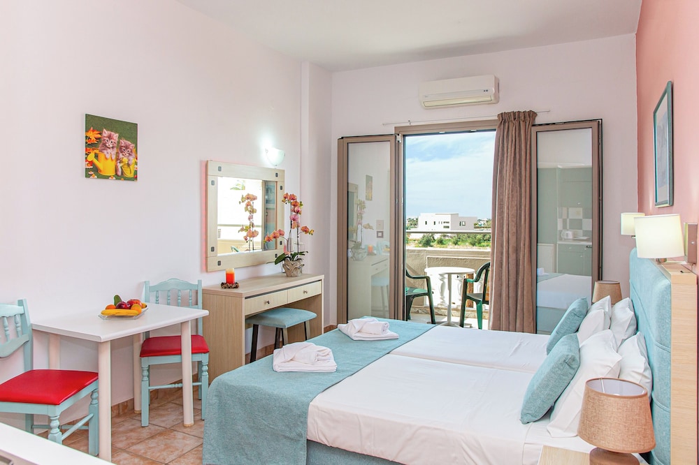 Theoni Apartments — Hotel rooms in Malia