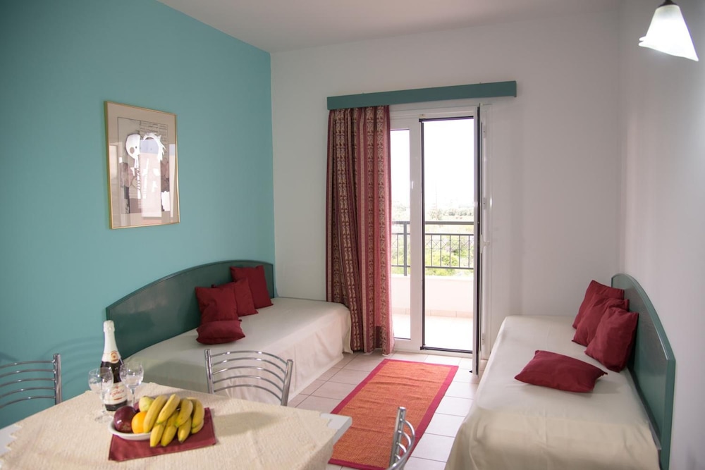 Theoni Apartments — Hotel rooms in Malia