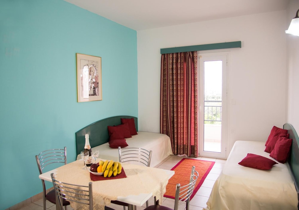 Theoni Apartments — Hotel rooms in Malia