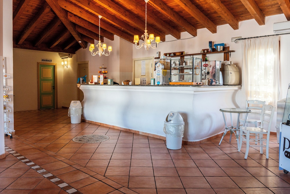 Residence Baia dei Mirti — Restaurant & bars in Aglientu, Sardinia