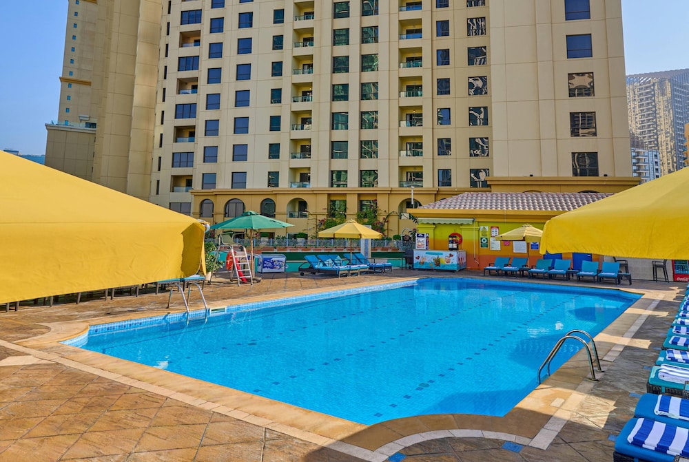 Ramada Hotel and Suites by Wyndham Dubai JBR — Swimming pool in Dubai