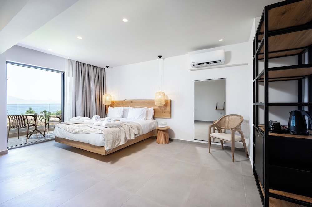 Sagredo Beachfront Retreat & Spa by E-GEO — Hotel rooms in Psalidi, South Aegean