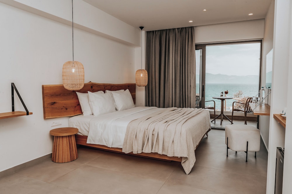 Sagredo Beachfront Retreat & Spa by E-GEO — Hotel rooms in Psalidi, South Aegean