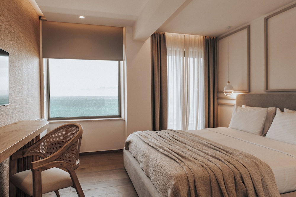 Sagredo Beachfront Retreat & Spa by E-GEO — Hotel rooms in Psalidi, South Aegean
