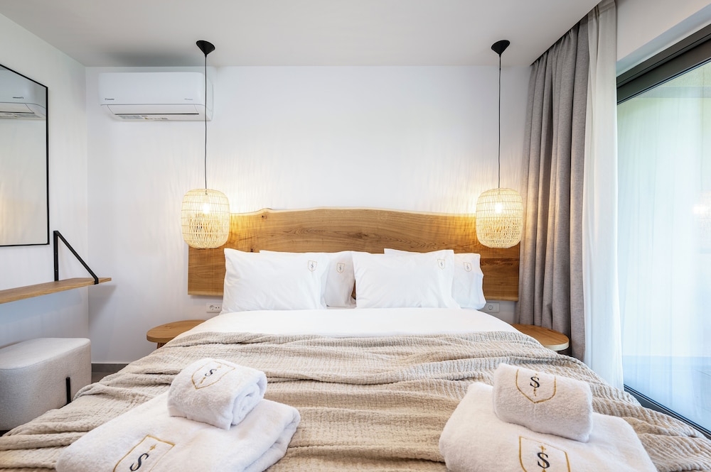 Sagredo Beachfront Retreat & Spa by E-GEO — Hotel rooms in Psalidi, South Aegean