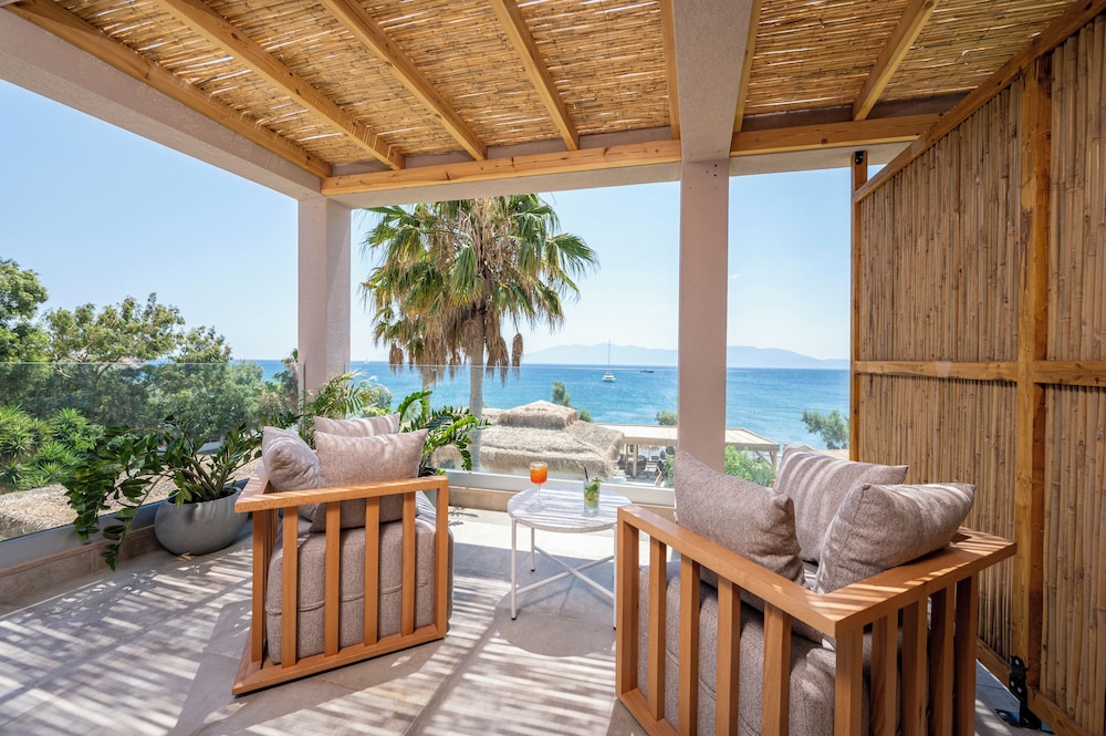 Sagredo Beachfront Retreat & Spa by E-GEO — Hotel rooms in Psalidi, South Aegean