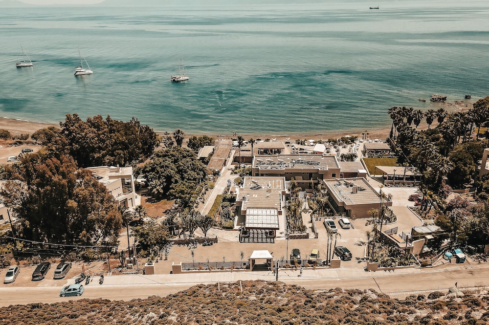 Sagredo Beachfront Retreat & Spa by E-GEO — Hotel building in Psalidi, South Aegean