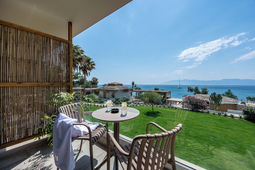 Sagredo Beachfront Retreat & Spa by E-GEO — Hotel rooms in Psalidi, South Aegean