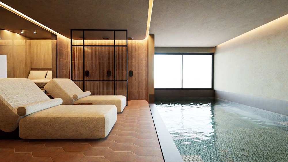 Sagredo Beachfront Retreat & Spa by E-GEO — Swimming pool in Psalidi, South Aegean