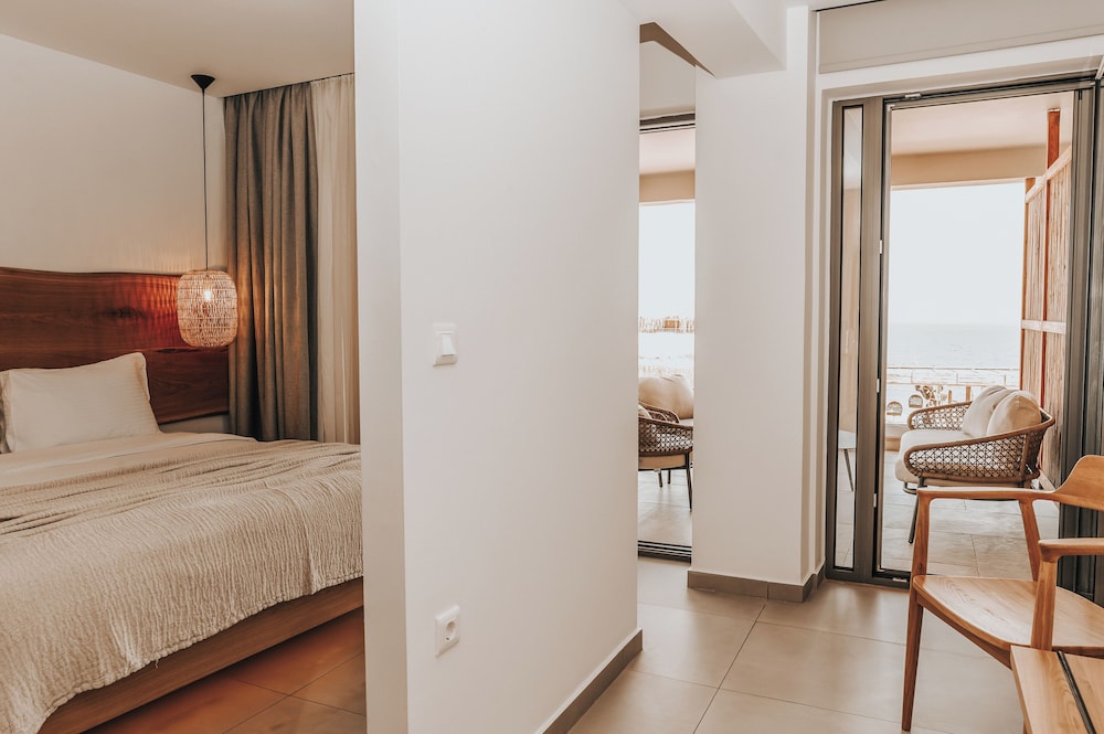 Sagredo Beachfront Retreat & Spa by E-GEO — Hotel rooms in Psalidi, South Aegean