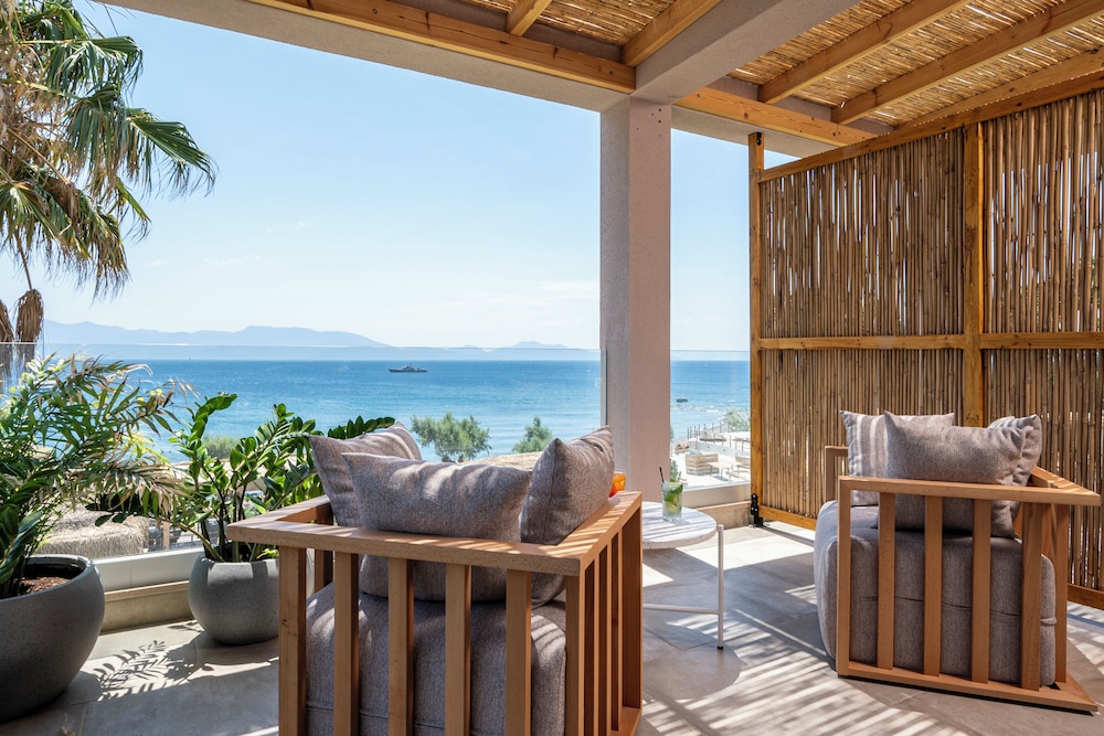Sagredo Beachfront Retreat & Spa by E-GEO — Hotel rooms in Psalidi, South Aegean