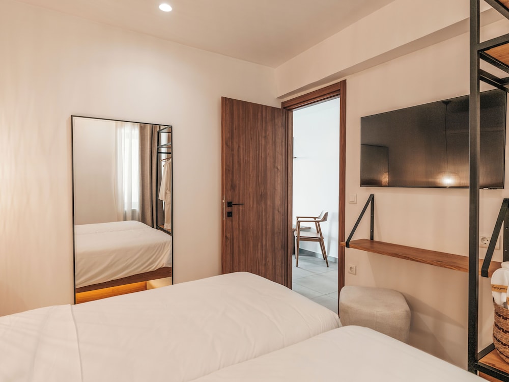 Sagredo Beachfront Retreat & Spa by E-GEO — Hotel rooms in Psalidi, South Aegean