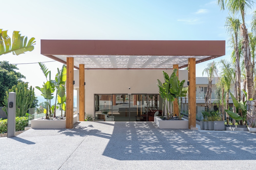 Sagredo Beachfront Retreat & Spa by E-GEO — Hotel building in Psalidi, South Aegean