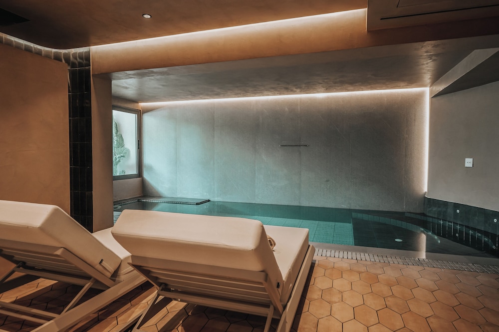 Sagredo Beachfront Retreat & Spa by E-GEO — Swimming pool in Psalidi, South Aegean