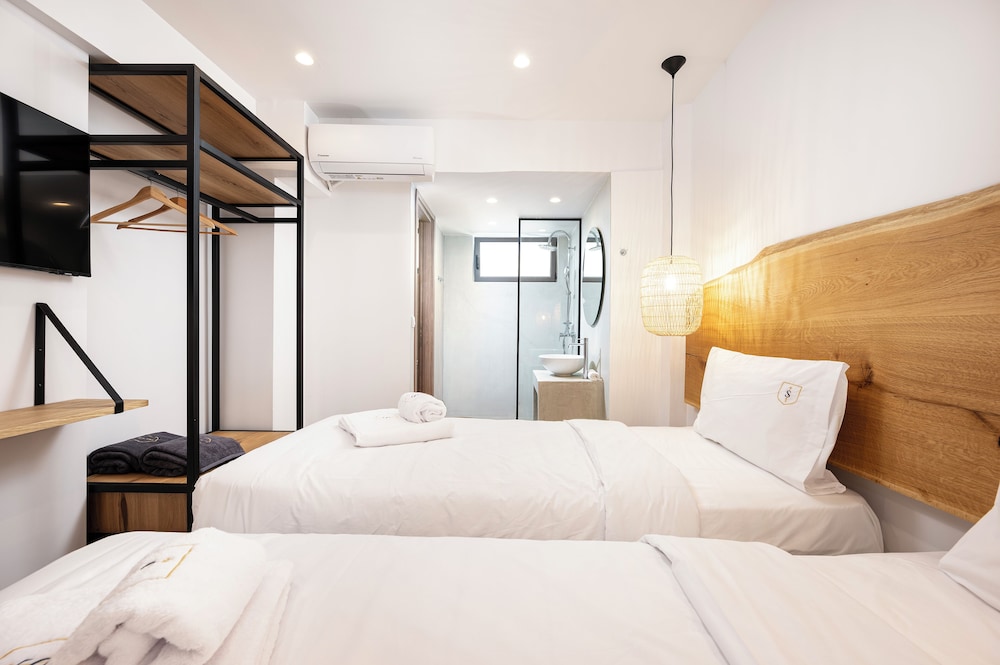 Sagredo Beachfront Retreat & Spa by E-GEO — Hotel rooms in Psalidi, South Aegean