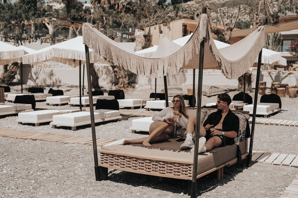 Sagredo Beachfront Retreat & Spa by E-GEO — Beach in Psalidi, South Aegean