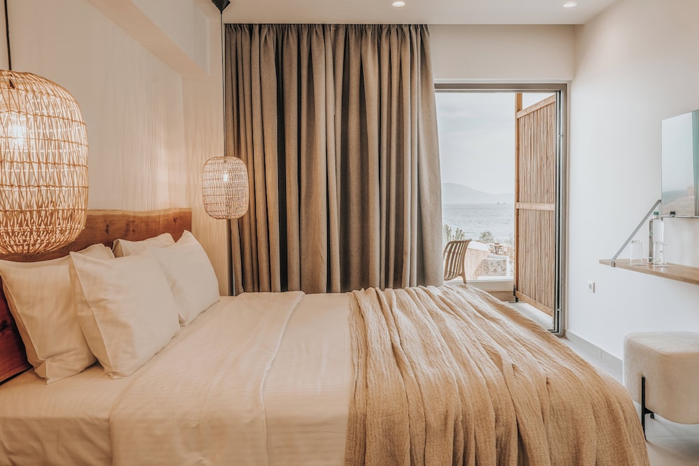 Sagredo Beachfront Retreat & Spa by E-GEO — Hotel rooms in Psalidi, South Aegean