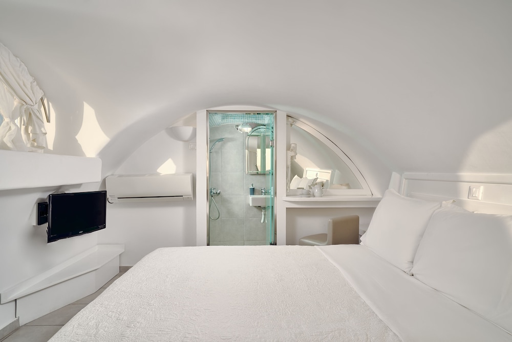Merovigliosso Apartments — Hotel rooms in Imerovigli, South Aegean