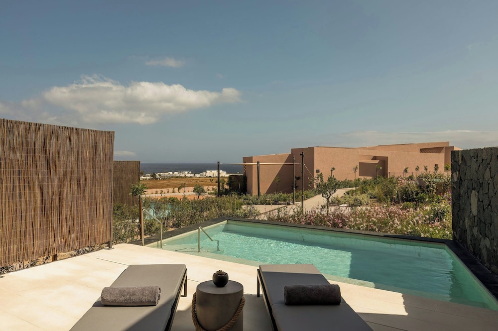 Domes Novos Santorini, Autograph Collection — Swimming pool in Oia, South Aegean