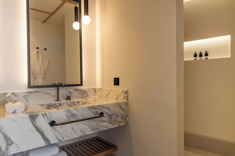 Domes Novos Santorini, Autograph Collection — Hotel rooms in Oia, South Aegean
