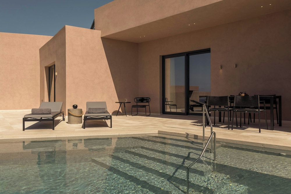 Domes Novos Santorini, Autograph Collection — Swimming pool in Oia, South Aegean
