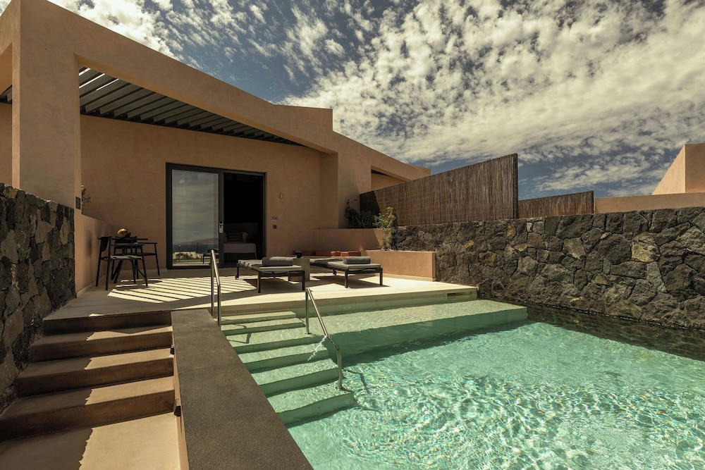 Domes Novos Santorini, Autograph Collection — Swimming pool in Oia, South Aegean