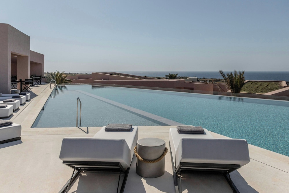 Domes Novos Santorini, Autograph Collection — Swimming pool in Oia, South Aegean