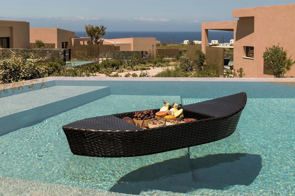 Domes Novos Santorini, Autograph Collection — Swimming pool in Oia, South Aegean