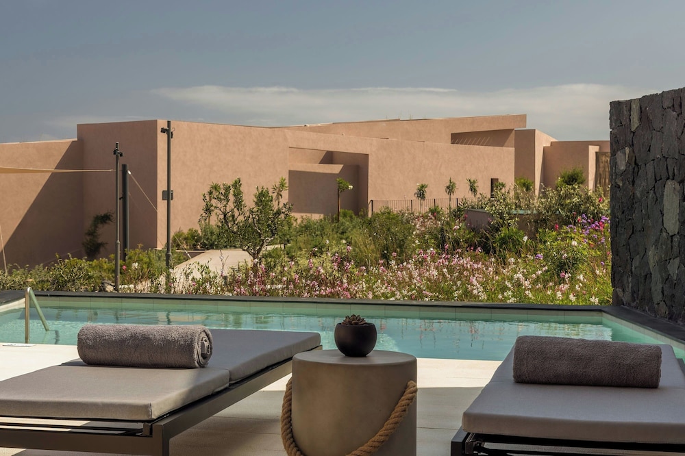 Domes Novos Santorini, Autograph Collection — Swimming pool in Oia, South Aegean