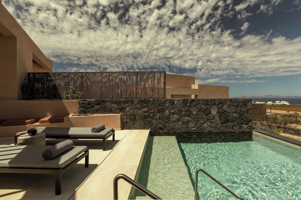 Domes Novos Santorini, Autograph Collection — Swimming pool in Oia, South Aegean