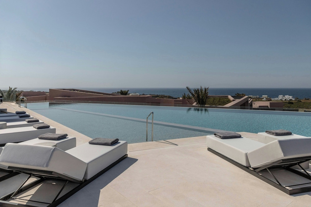 Domes Novos Santorini, Autograph Collection — Swimming pool in Oia, South Aegean
