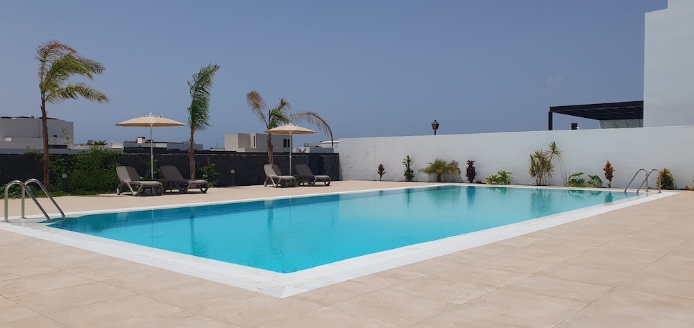 Serena Holiday Homes by LIVVO — Swimming pool in Playa Blanca, Canary Islands