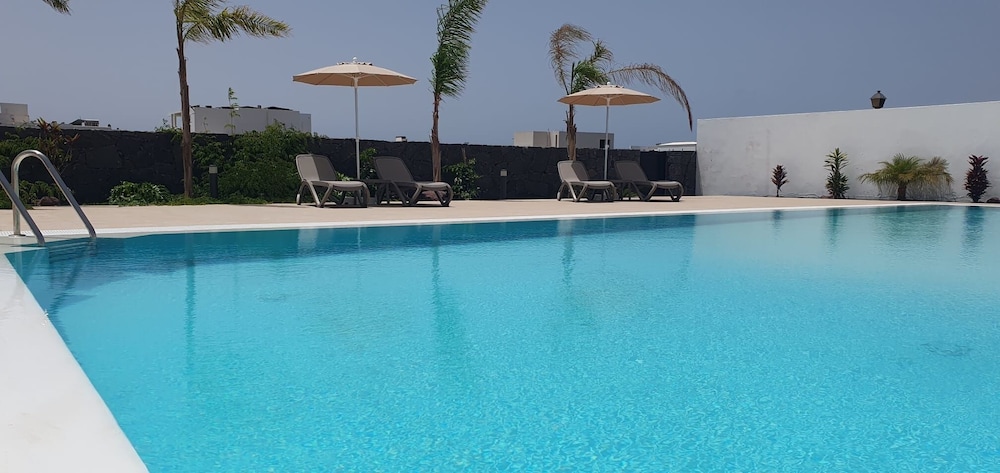 Serena Holiday Homes by LIVVO — Swimming pool in Playa Blanca, Canary Islands