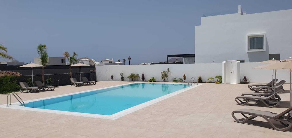 Serena Holiday Homes by LIVVO — Swimming pool in Playa Blanca, Canary Islands