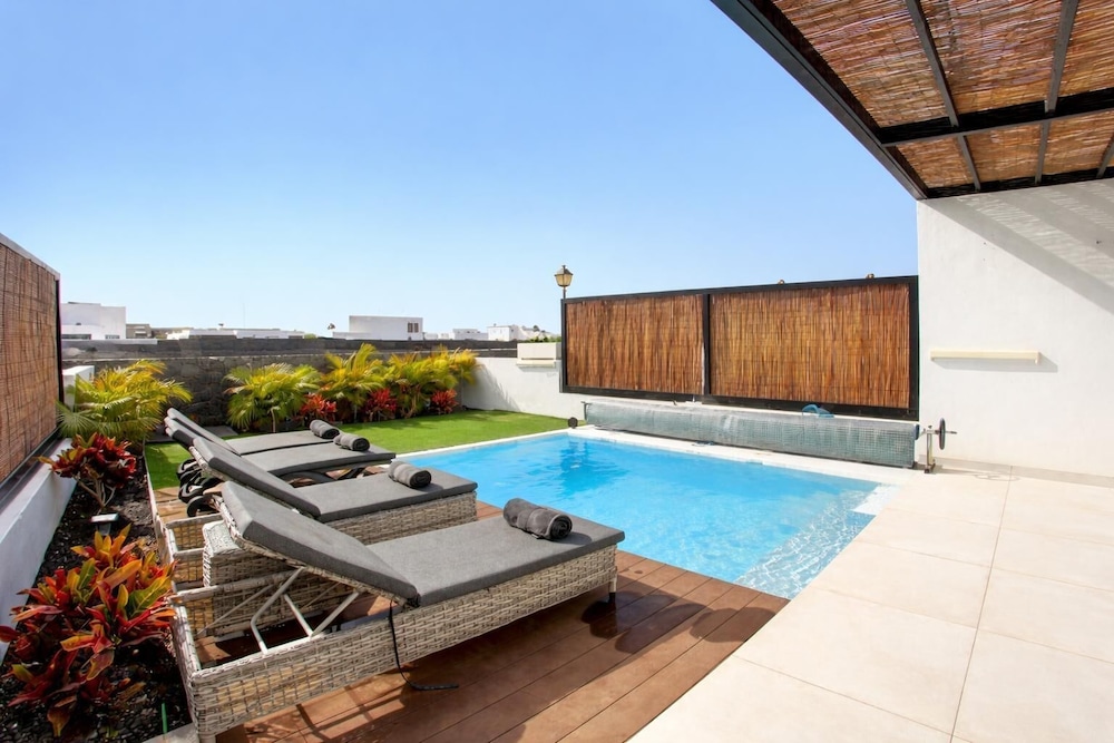 Serena Holiday Homes by LIVVO — Swimming pool in Playa Blanca, Canary Islands