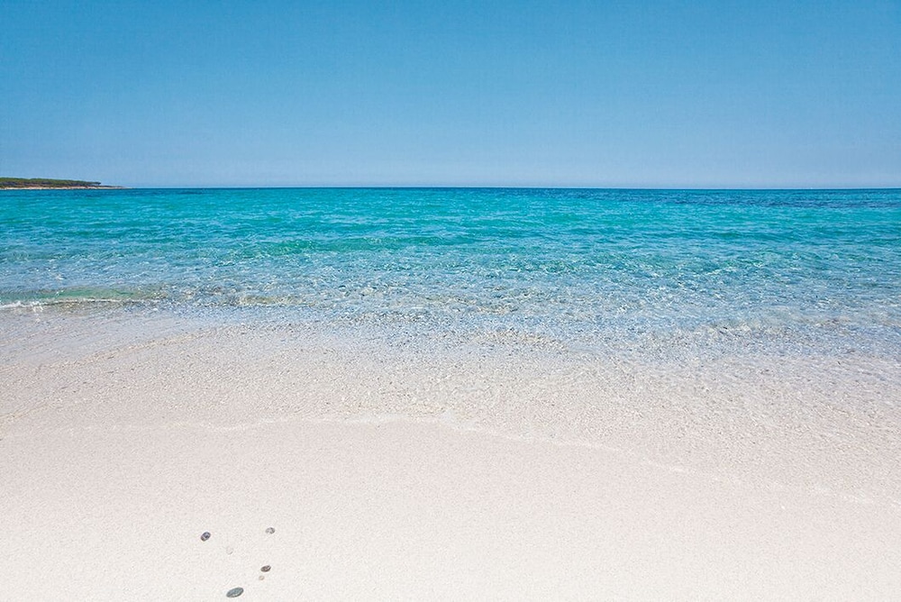 Hotel Club Cala Fiorita — Beach in Budoni, Sardinia