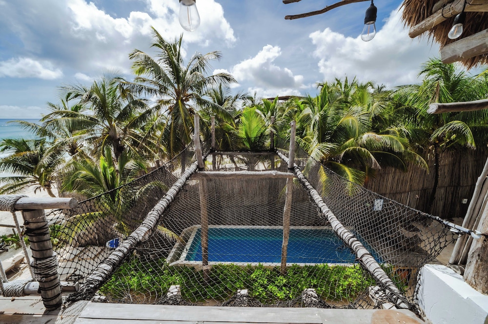 Dune Boutique Hotel located at the party zone — Swimming pool in Tulum, Quintana Roo