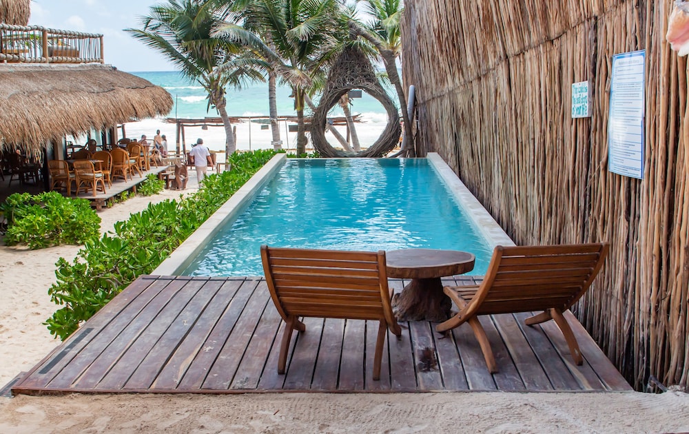 Dune Boutique Hotel located at the party zone — Swimming pool in Tulum, Quintana Roo