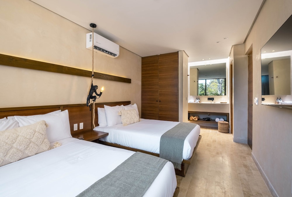 Collection O Faisano Boutique Hotel, Spa, Transportation, Rentals & Tours, Tulum — Hotel rooms in Tulum, Quintana Roo