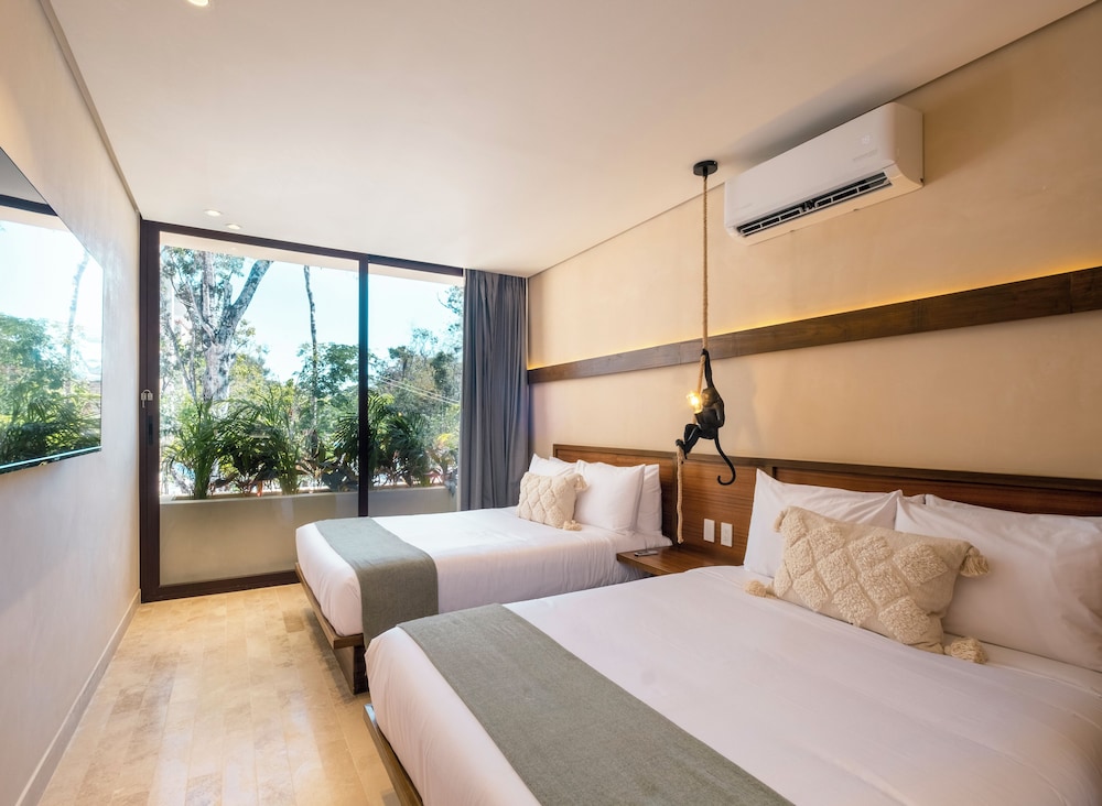 Collection O Faisano Boutique Hotel, Spa, Transportation, Rentals & Tours, Tulum — Hotel rooms in Tulum, Quintana Roo