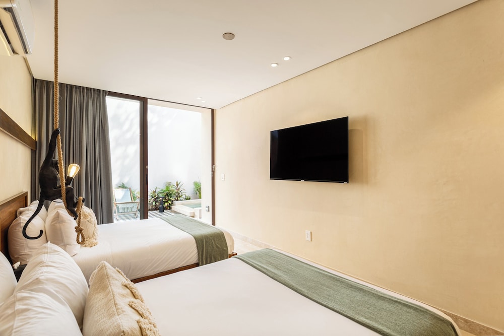 Collection O Faisano Boutique Hotel, Spa, Transportation, Rentals & Tours, Tulum — Hotel rooms in Tulum, Quintana Roo