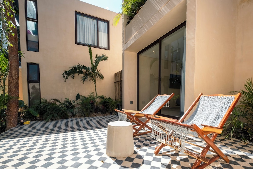 Collection O Faisano Boutique Hotel, Spa, Transportation, Rentals & Tours, Tulum — Hotel building in Tulum, Quintana Roo