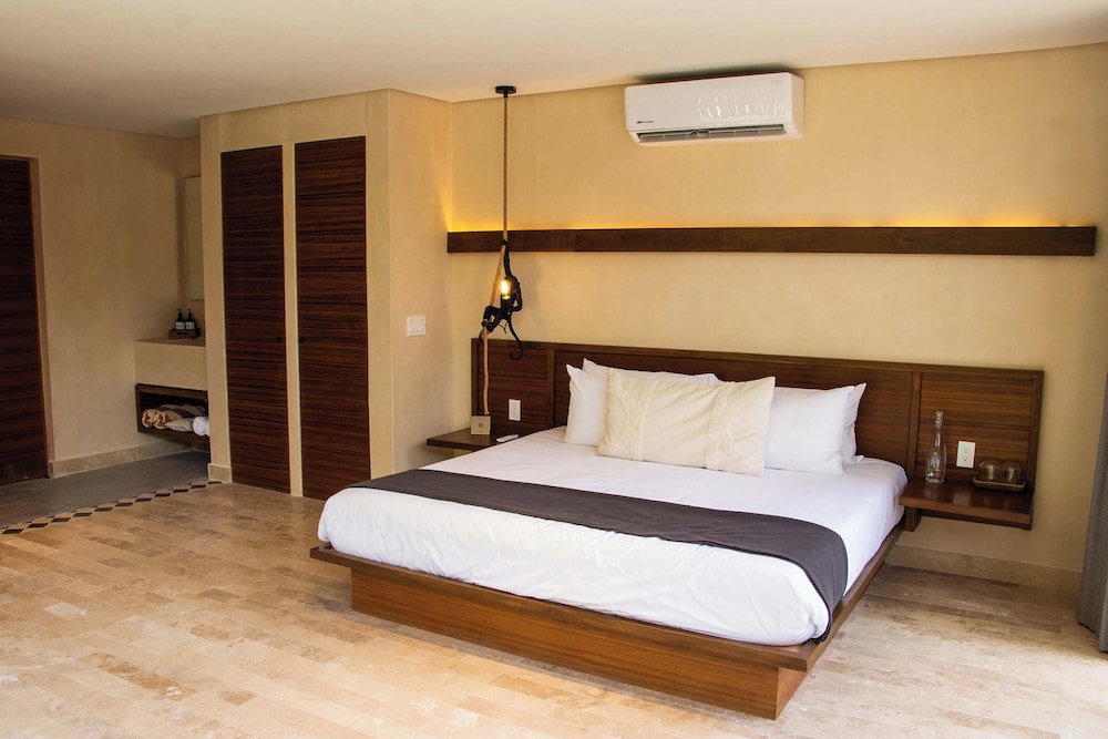 Collection O Faisano Boutique Hotel, Spa, Transportation, Rentals & Tours, Tulum — Hotel rooms in Tulum, Quintana Roo