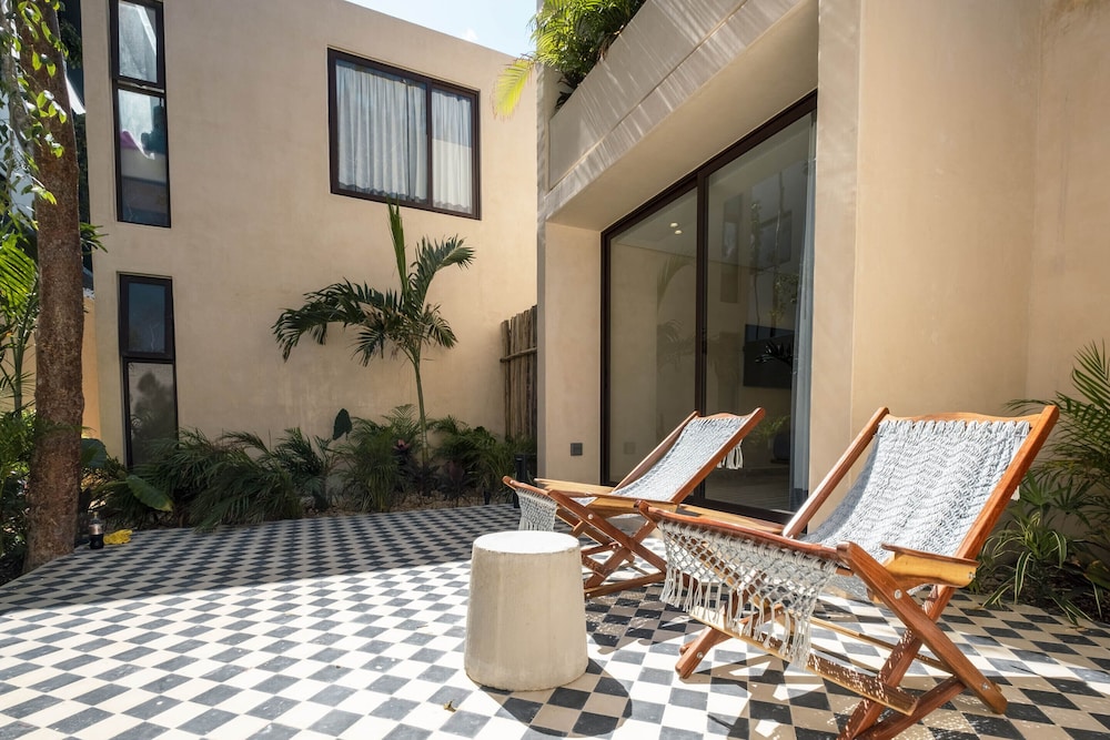 Collection O Faisano Boutique Hotel, Spa, Transportation, Rentals & Tours, Tulum — Hotel building in Tulum, Quintana Roo