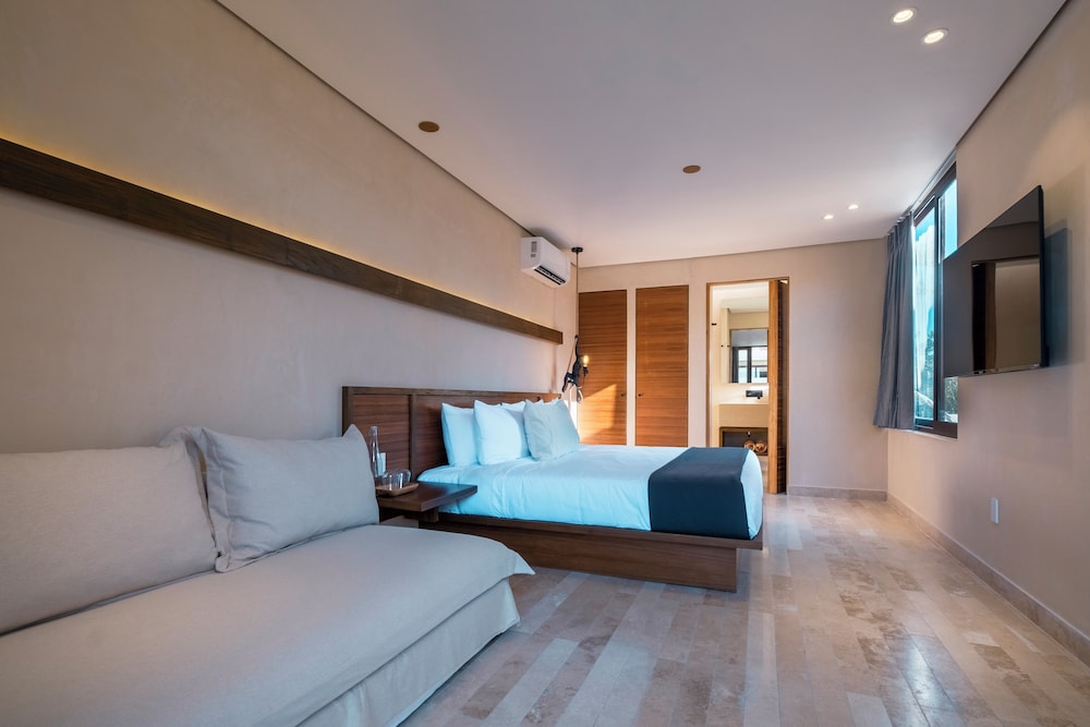 Collection O Faisano Boutique Hotel, Spa, Transportation, Rentals & Tours, Tulum — Hotel rooms in Tulum, Quintana Roo