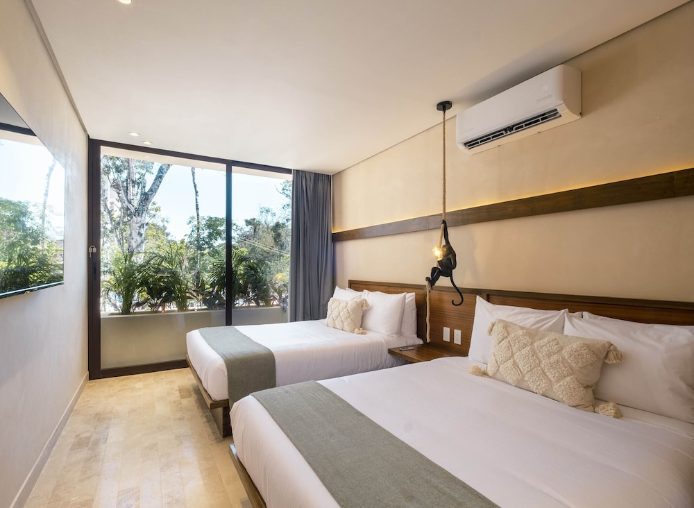 Collection O Faisano Boutique Hotel, Spa, Transportation, Rentals & Tours, Tulum — Hotel rooms in Tulum, Quintana Roo