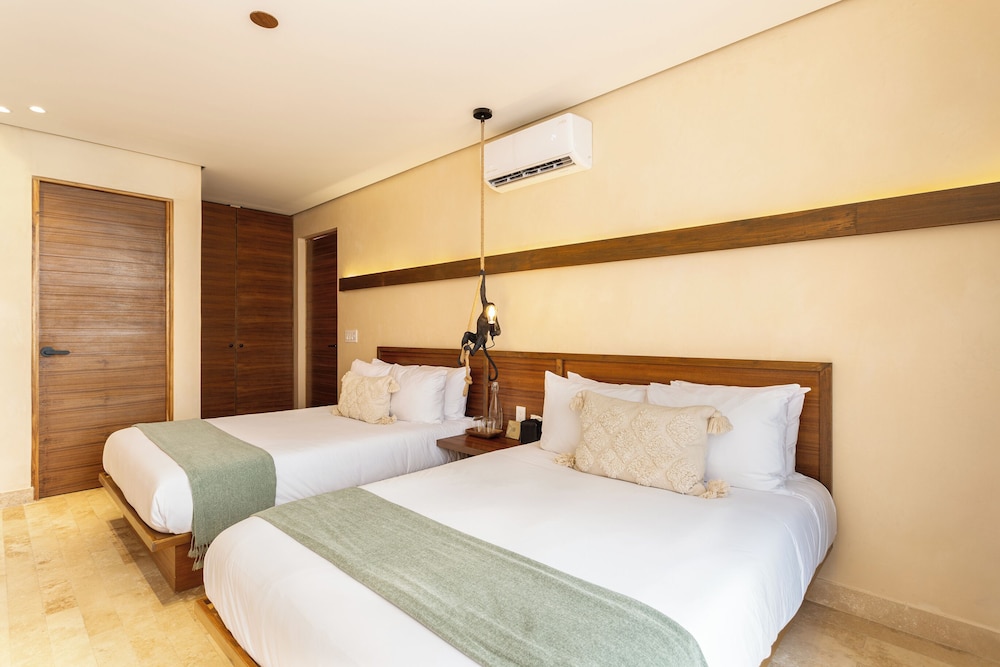 Collection O Faisano Boutique Hotel, Spa, Transportation, Rentals & Tours, Tulum — Hotel rooms in Tulum, Quintana Roo
