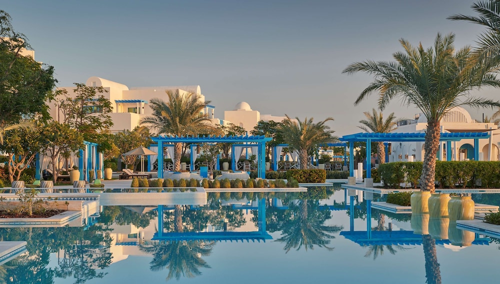 Hilton Salwa Beach Resort & Villas — Swimming pool in Abu Samra